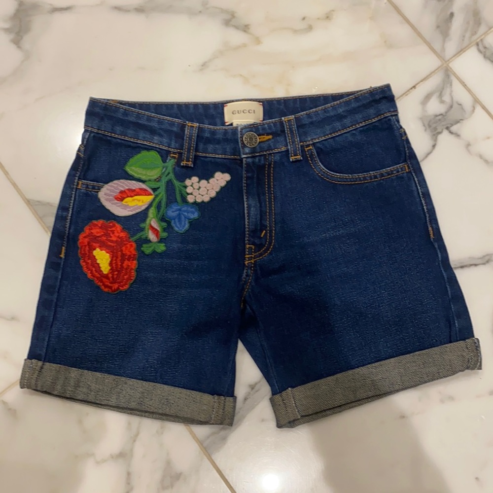Gucci girls denim shorts with floral embroidery. Size 10. New condition